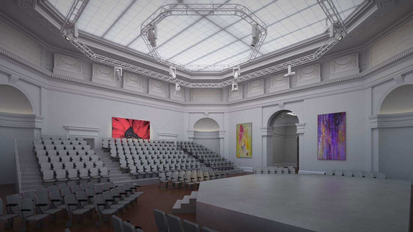 white auditorium with a glass ceiling