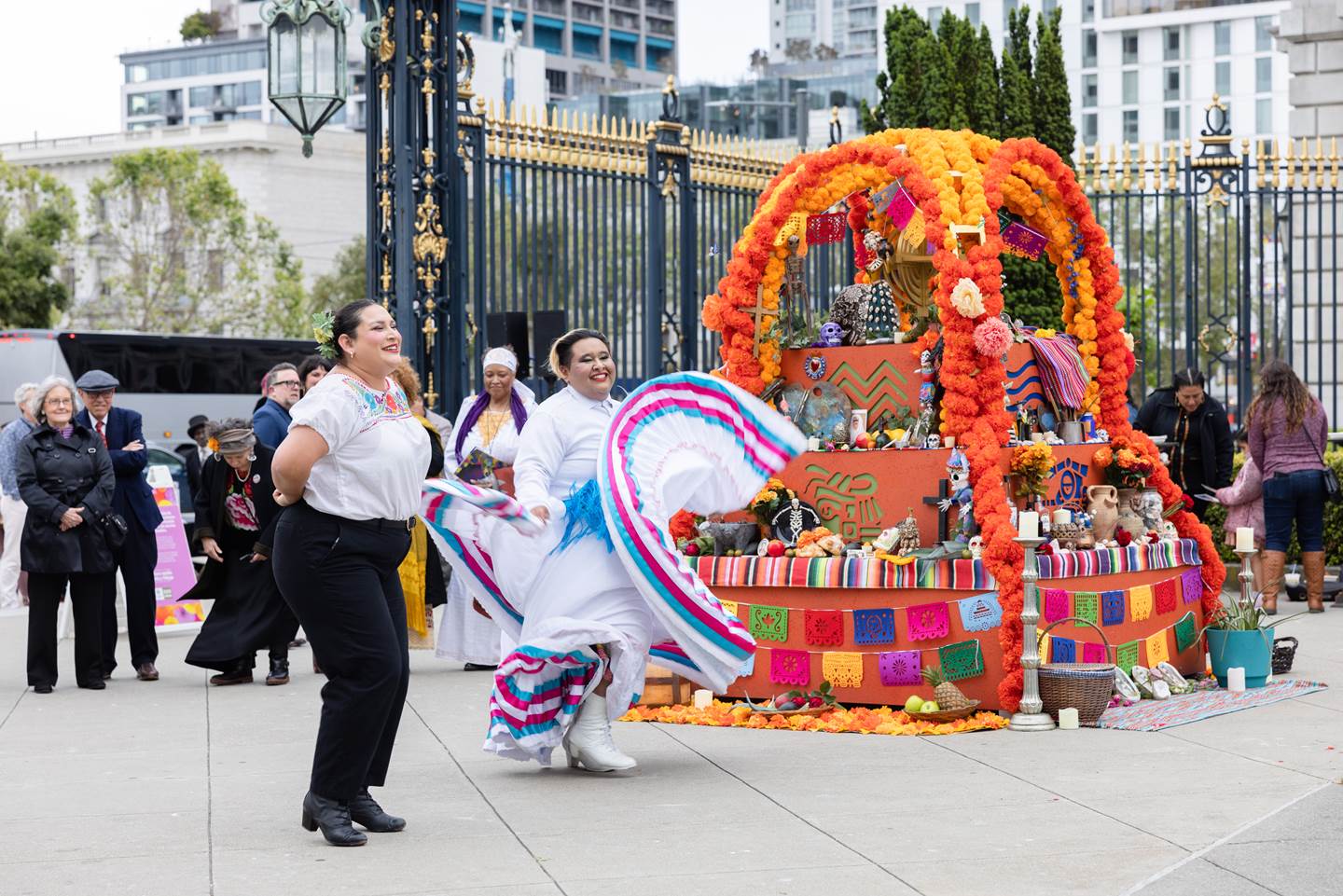 performers dancing in front of alter