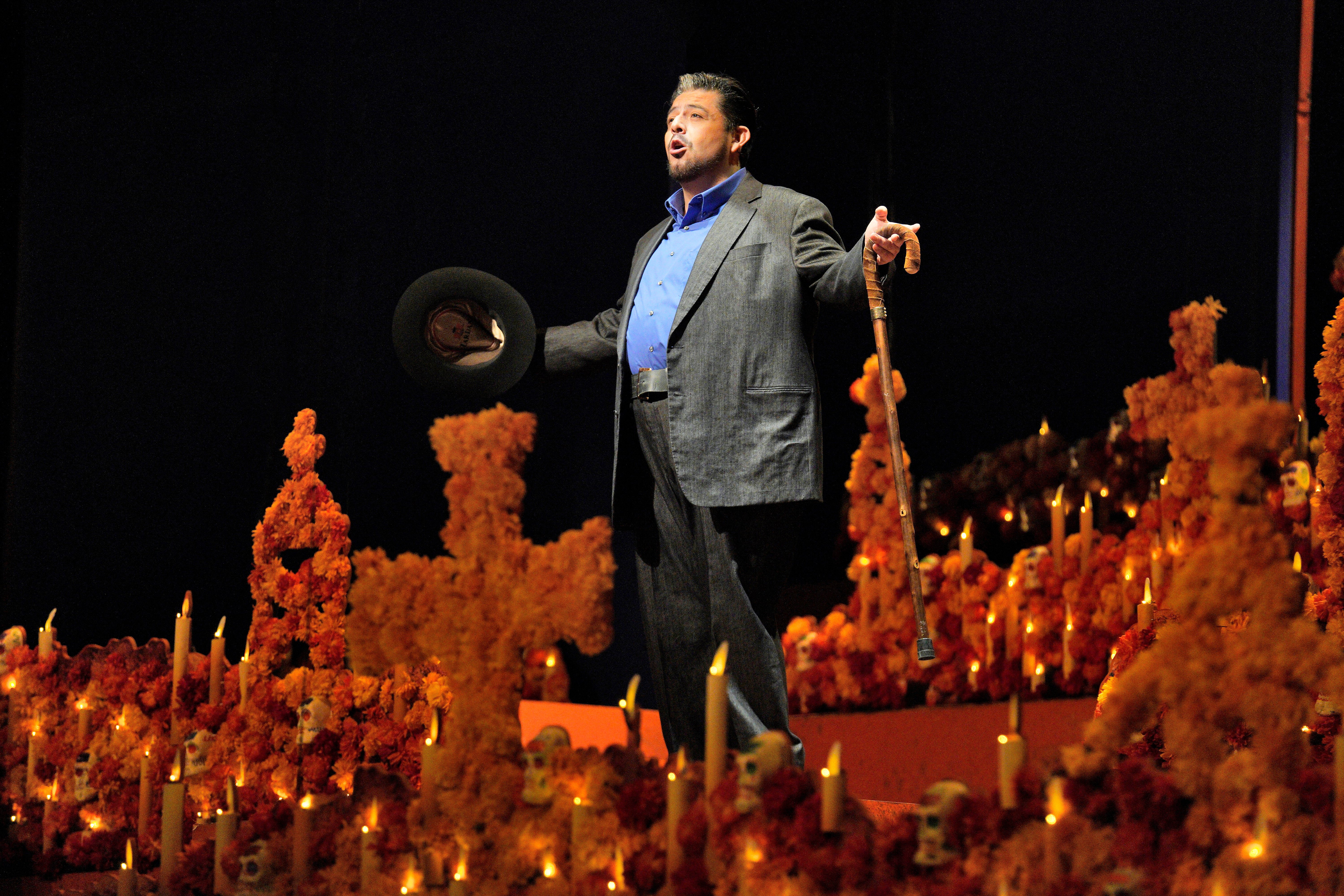 Scene from Frida of a man singing at an alter