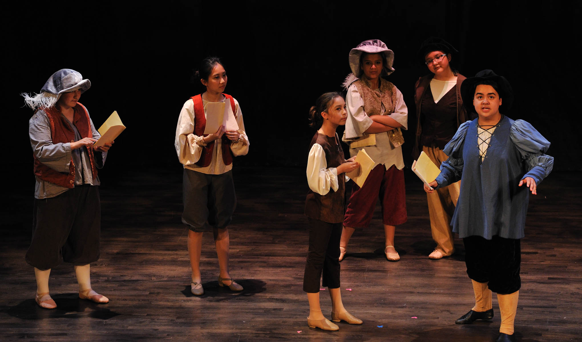 Scouts performing opera on stage