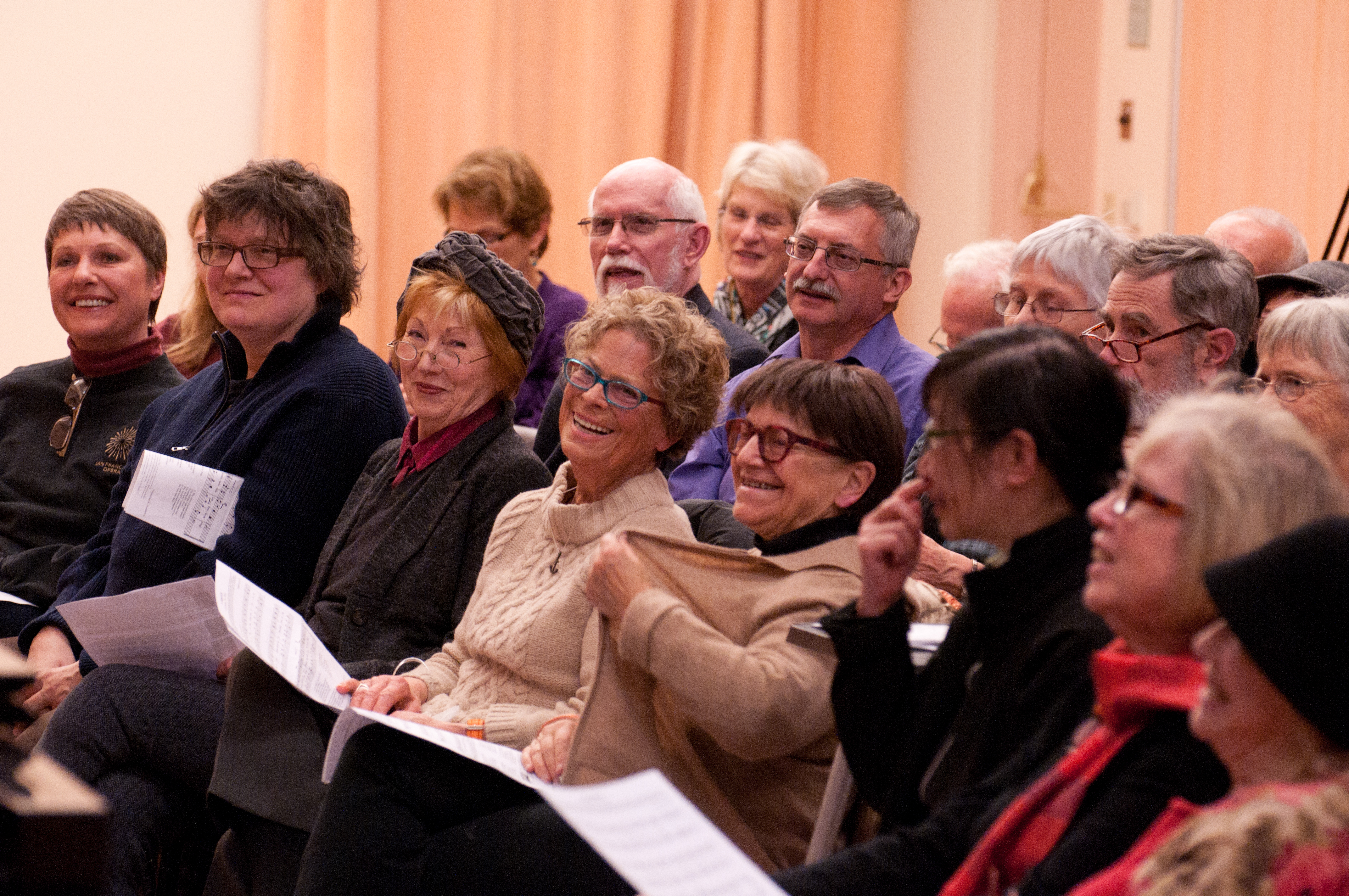 Adults listening to lecture