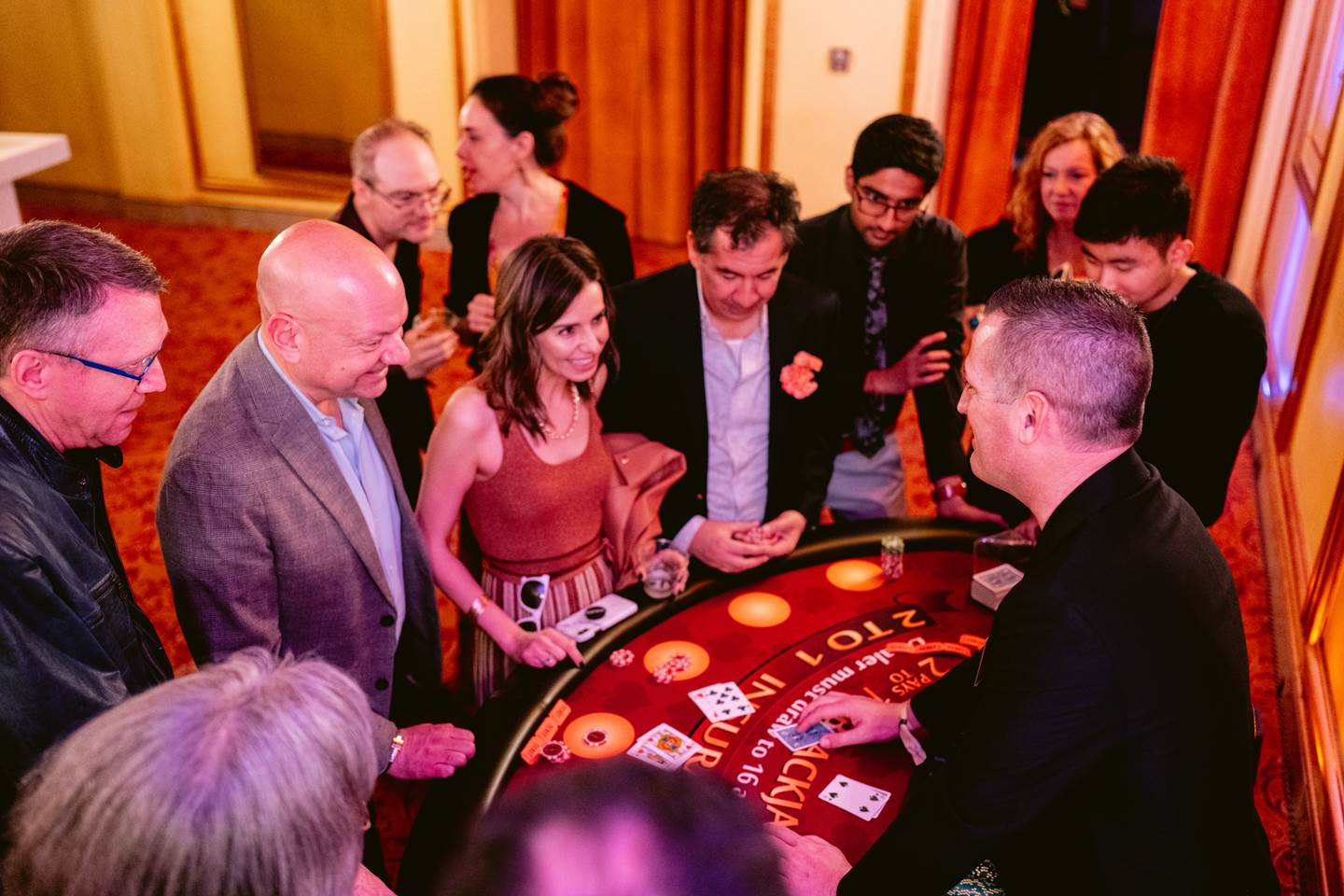 Patrons at a blackjack table