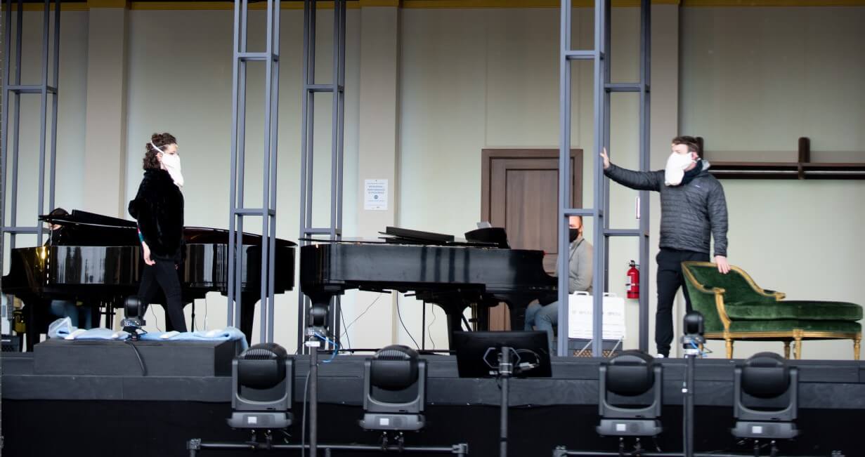 Opera singers rehearsing in VOXCV masks